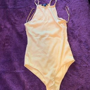 A cute yellow bodysuit only used 2 times